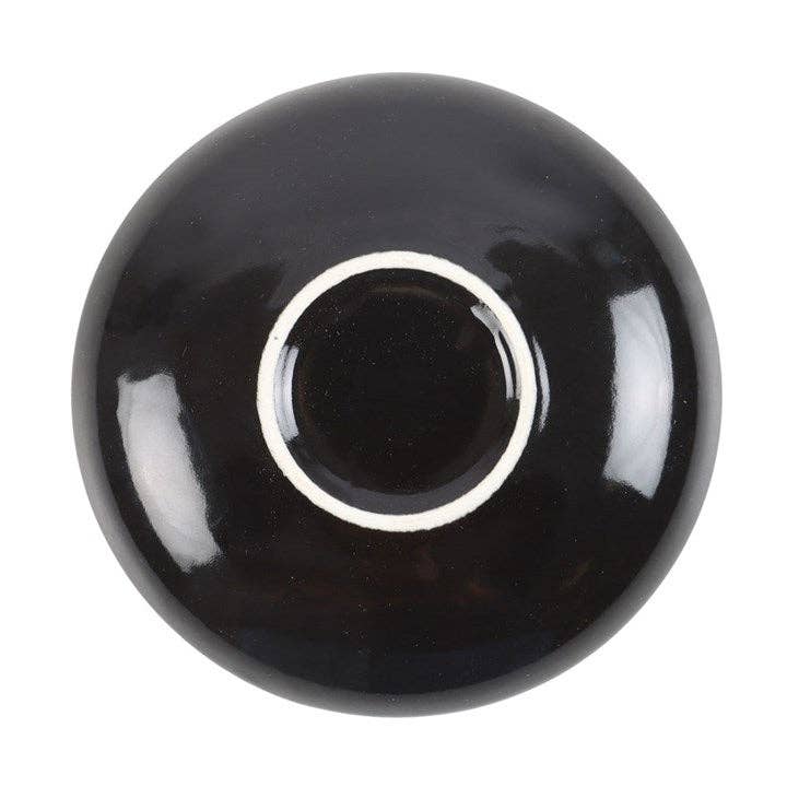Runde schwarze Schmuckschale mit Sprechbrett
